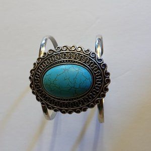Turquoise cuff bracelet.
